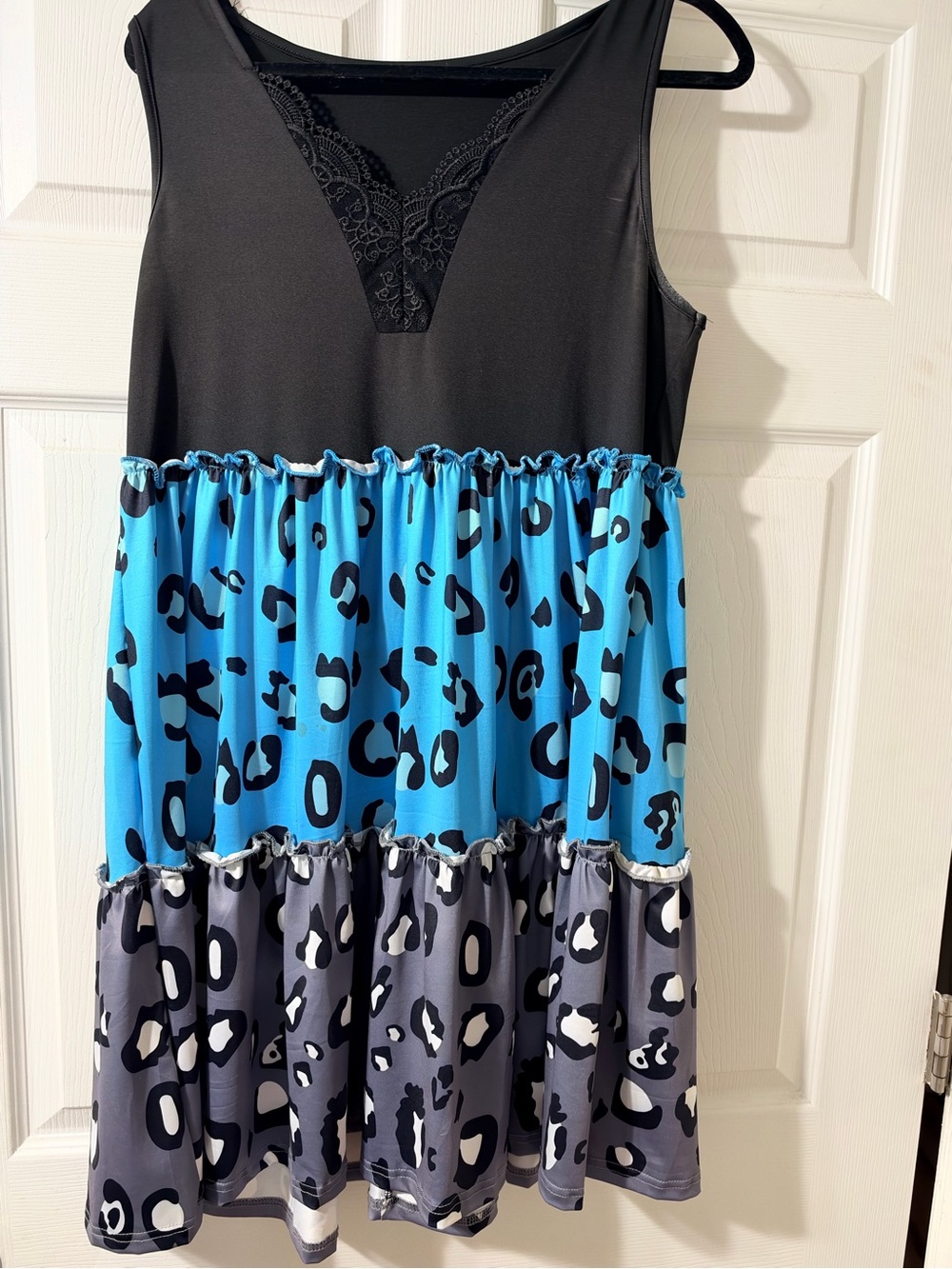 Woman’s Tiered Leopard Print Dress in Black and Blue